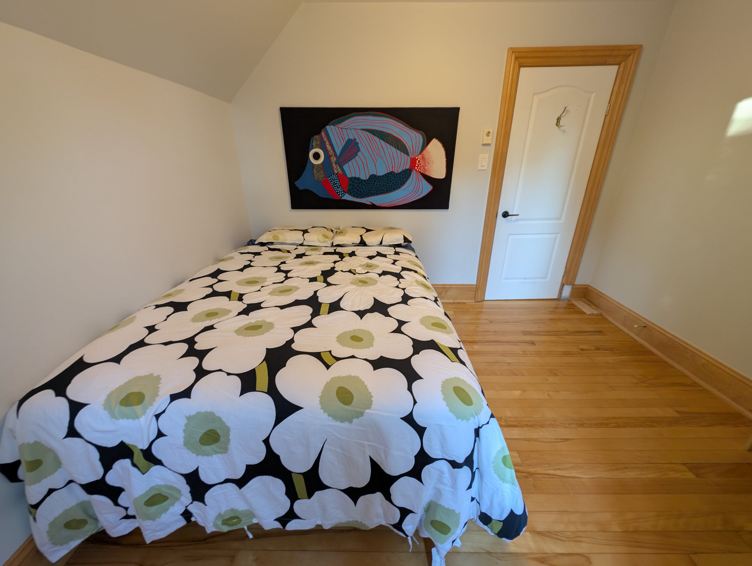 Upstairs bedroom with hardwood floors